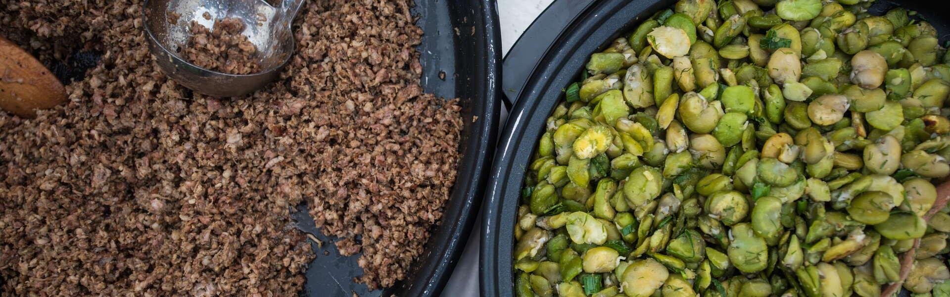 Two plates of food: one with broad beans, the other with buckwheat groats